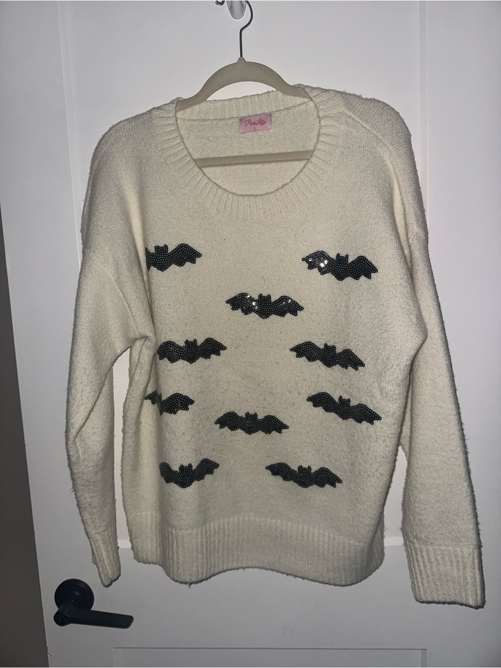 Pink Lily Cream Crewneck Sweater with Black Sequin Bats
